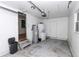 The garage features laundry, a water heater, and door access to the sunroom at 426 Sw 13Th St, Ocala, FL 34471