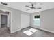 Charming bedroom with closet, updated flooring and light gray walls at 4314 Se 131St Ln, Belleview, FL 34420