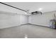 Well-lit garage with a sealed floor and plenty of open space at 4314 Se 131St Ln, Belleview, FL 34420