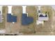 Overhead shot showing a home and adjacent properties in a neatly arranged neighborhood setting at 4415 Sw 169Th Lane Rd, Ocala, FL 34473