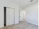 Neutral bedroom offering spacious closet and light-colored, durable flooring at 4415 Sw 169Th Lane Rd, Ocala, FL 34473