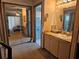 Bathroom with a single sink vanity and a shower at 516 Marion Oaks Dr, Ocala, FL 34473