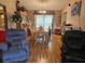 The dining room features a dining table set and an armchair at 516 Marion Oaks Dr, Ocala, FL 34473