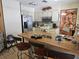A kitchen with an island and bar stools at 516 Marion Oaks Dr, Ocala, FL 34473