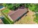 Birds-eye view of the property featuring its roof, surrounding yard, and neighborhood at 5737 Nw 65Th Pl, Ocala, FL 34482
