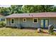 Exterior view of the home's backyard showing a compact outdoor space at 5737 Nw 65Th Pl, Ocala, FL 34482