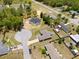 Aerial view of neighborhood with homes, trees and cul-de-sac at 60 Hemlock Trl, Ocala, FL 34472