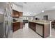 Modern kitchen featuring stainless steel appliances, granite countertops and lots of cabinet space at 60 Hemlock Trl, Ocala, FL 34472