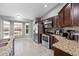 Eat in kitchen area featuring stainless steel appliances and views into the back yard at 60 Hemlock Trl, Ocala, FL 34472