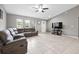 Open living room featuring tile flooring, recessed lighting and a ceiling fan at 60 Hemlock Trl, Ocala, FL 34472