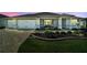 Charming single-story home with a well-manicured front yard and two-car garage at 8457 Sw 97Th Cir, Ocala, FL 34481