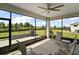 Spacious lanai offering serene outdoor views, comfortable seating, and a breezy atmosphere, ideal for enjoying nature at 8457 Sw 97Th Cir, Ocala, FL 34481