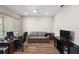 Functional home office space with a desk, comfortable seating, and modern amenities, perfect for remote work or study at 8457 Sw 97Th Cir, Ocala, FL 34481