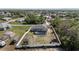 Aerial view of a fenced backyard featuring a pool, trampoline, shed, and well-maintained landscaping at 9940 Sw 45Th Ave, Ocala, FL 34476