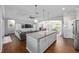 Bright, open kitchen with granite island, breakfast bar, and stainless appliances at 9940 Sw 45Th Ave, Ocala, FL 34476