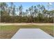 New construction home back yard with a pad and room to play or garden at 13349 Sw 113Th Pl, Dunnellon, FL 34432