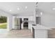 Modern kitchen with stainless steel appliances, and quartz countertops at 13349 Sw 113Th Pl, Dunnellon, FL 34432