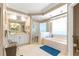 Bathroom featuring a double vanity, tub, and walk-in shower at 13885 Del Webb Blvd, Summerfield, FL 34491