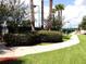 Well-maintained tennis courts surrounded by lush landscaping are perfect for a match at 13885 Del Webb Blvd, Summerfield, FL 34491