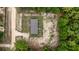 Drone shot of the top of the home on a partially cleared wooded lot at 16231 Sw 20Th Ln, Ocala, FL 34481