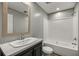 Bathroom with a single vanity, sleek mirror, and modern fixtures at 16231 Sw 20Th Ln, Ocala, FL 34481
