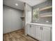 Well-organized pantry featuring ample storage with shelving and cabinetry at 16231 Sw 20Th Ln, Ocala, FL 34481