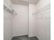 Walk-in closet with wire shelving and neutral colors, creating ample storage space at 17755 Se 117Th Cir, Summerfield, FL 34491