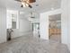 Inviting living room showing tiled floors that seamlessly connect the living room to other areas at 17755 Se 117Th Cir, Summerfield, FL 34491