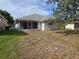 View of screened-in porch and backyard at 17974 Se 115Th Cir, Summerfield, FL 34491