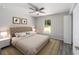 Inviting bedroom features a neutral color scheme, plush carpet, and ample natural light that is sure to impress at 23163 Nw Shamrock Ave, Dunnellon, FL 34431