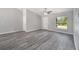 Open living space featuring wood-look flooring, fresh paint, and natural light at 23163 Nw Shamrock Ave, Dunnellon, FL 34431