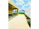 Backyard patio and plantings, showcasing the patio's outdoor living space at 3023 Charlevoix St, The Villages, FL 32163