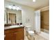 This full bath features a single sink vanity and shower-tub combo at 3023 Charlevoix St, The Villages, FL 32163
