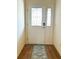 Bright entryway featuring a decorative glass door and a patterned rug at 3023 Charlevoix St, The Villages, FL 32163
