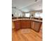 Well-lit kitchen features stainless steel dishwasher and a dual-basin sink at 3023 Charlevoix St, The Villages, FL 32163