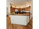 Spacious kitchen features dark cabinetry and a large countertop space at 3023 Charlevoix St, The Villages, FL 32163