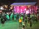 The Villages Town Square with people enjoying a live band and outdoor dancing at 3023 Charlevoix St, The Villages, FL 32163