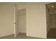 An empty bedroom offers a closet for storage space, featuring neutral walls and carpet at 356 Se 66Th Ct, Ocala, FL 34472