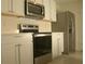A kitchen featuring stainless steel appliances including oven, microwave, and refrigerator at 356 Se 66Th Ct, Ocala, FL 34472