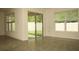 An airy patio with tiled floors, screened windows and sliding glass door at 356 Se 66Th Ct, Ocala, FL 34472