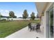 Spacious backyard with lush green grass, patio, and privacy fence at 4620 Sw 42Nd St, Ocala, FL 34474
