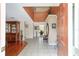 Entryway featuring tile flooring, hardwood accents, and an open floor plan at 4620 Sw 42Nd St, Ocala, FL 34474