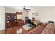 Home office with floral accent chair, desk, and ceiling fan at 4620 Sw 42Nd St, Ocala, FL 34474
