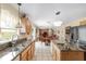 Bright, open kitchen with granite countertops and stainless appliances at 4620 Sw 42Nd St, Ocala, FL 34474
