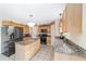 Spacious kitchen with stainless steel appliances and granite countertops at 4620 Sw 42Nd St, Ocala, FL 34474