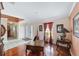 Bright living room featuring hardwood floors and ample natural light at 4620 Sw 42Nd St, Ocala, FL 34474