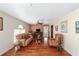 Cozy living room featuring hardwood floors and a ceiling fan at 4620 Sw 42Nd St, Ocala, FL 34474