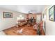 Living room featuring hardwood floors and comfortable seating at 4620 Sw 42Nd St, Ocala, FL 34474