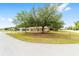 Charming single-story home with mature trees and a well-maintained lawn at 4886 Nw 30Th Pl, Ocala, FL 34482