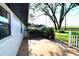Private backyard with patio, lush greenery, and fence at 5351 Sw 80Th Pl, Ocala, FL 34476